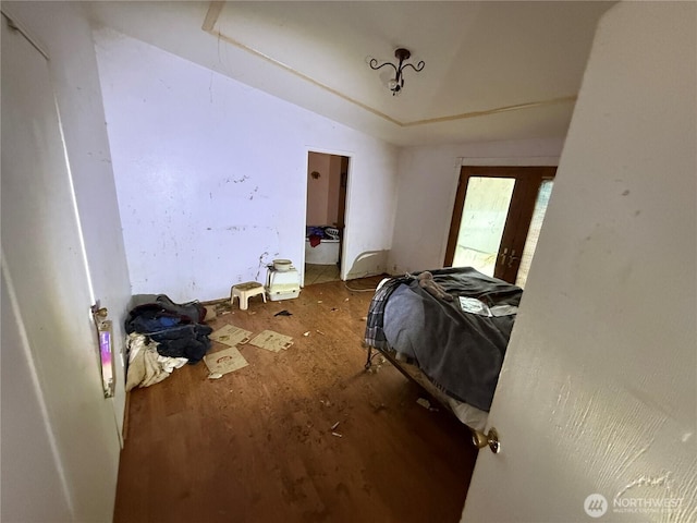 bedroom featuring wood finished floors