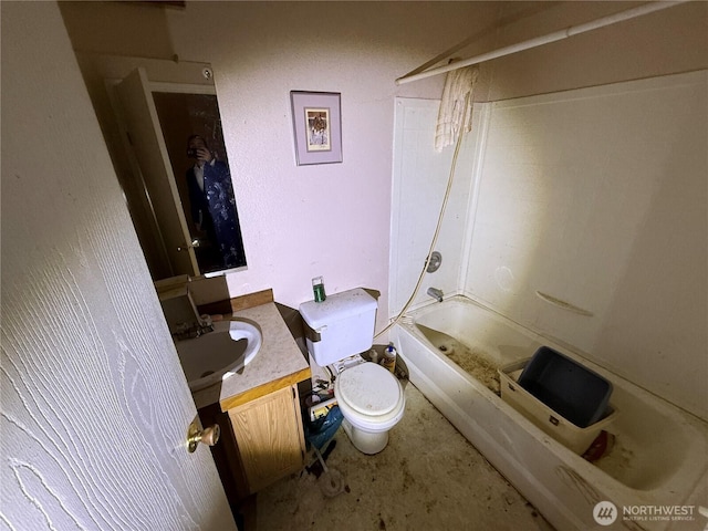 bathroom with shower / bathing tub combination, vanity, and toilet