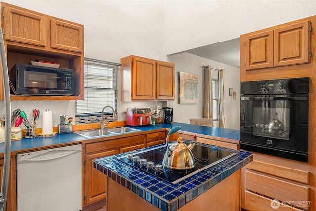 kitchen featuring tile counters, a kitchen island, black appliances, open shelves, and a sink