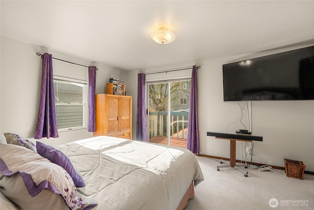 bedroom featuring carpet floors, access to outside, and baseboards