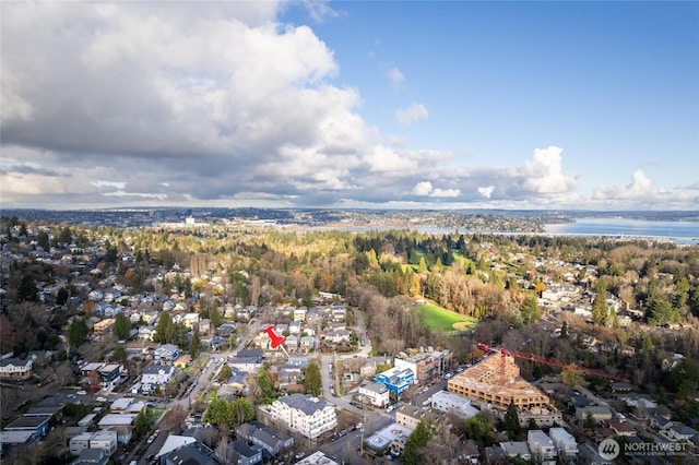 birds eye view of property featuring a water view