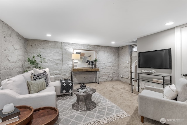 carpeted living room featuring recessed lighting