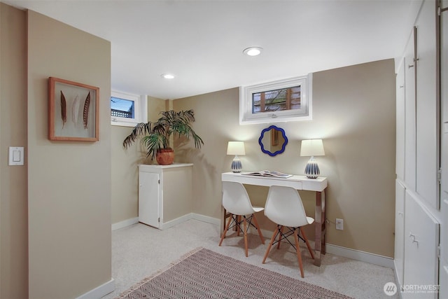 office space with baseboards, light colored carpet, and recessed lighting