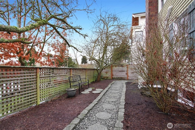 view of yard featuring a fenced backyard