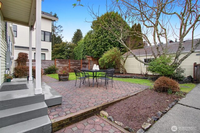 view of patio / terrace featuring outdoor dining space and a fenced backyard