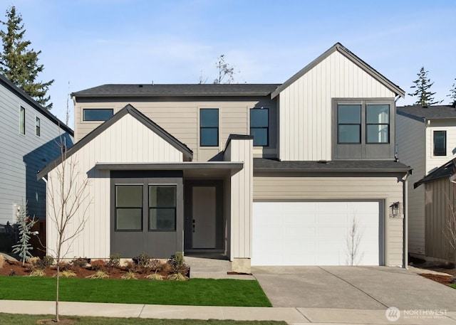 modern farmhouse style home with a garage, driveway, and board and batten siding