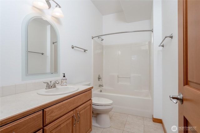 full bath with bathtub / shower combination, vanity, toilet, and tile patterned floors