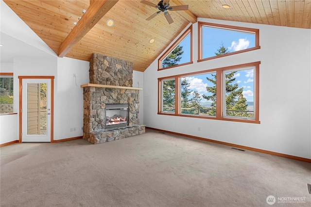 6760 Forest Ridge Dr, Wenatchee, WA 98801 - unfurnished living room with carpet flooring, a stone fireplace, high vaulted ceiling, a wooden ceiling with exposed beams, and ceiling fan