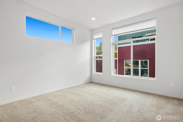 unfurnished room with baseboards, carpet flooring, and recessed lighting