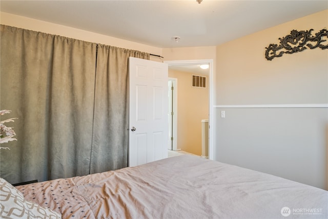 bedroom with visible vents