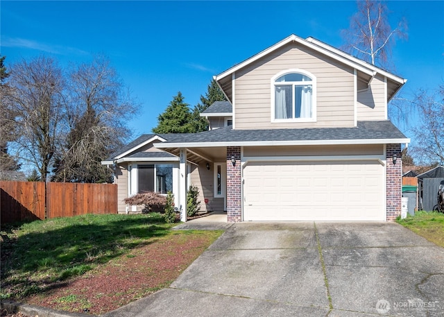 traditional home featuring fence, driveway, a shingled roof, a front lawn, and brick siding