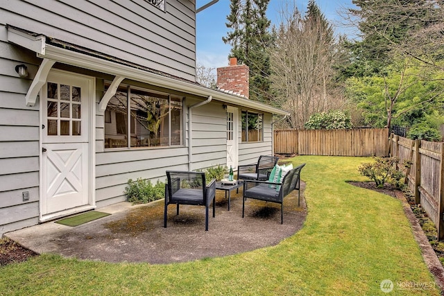 view of yard with a patio and a fenced backyard