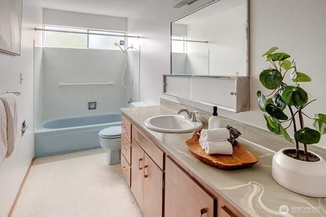 full bath featuring toilet, vanity, and shower / bath combination