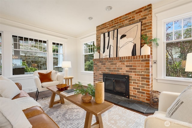 sunroom / solarium with a brick fireplace