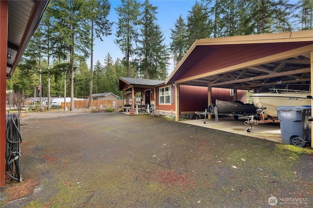 view of home's exterior with a carport