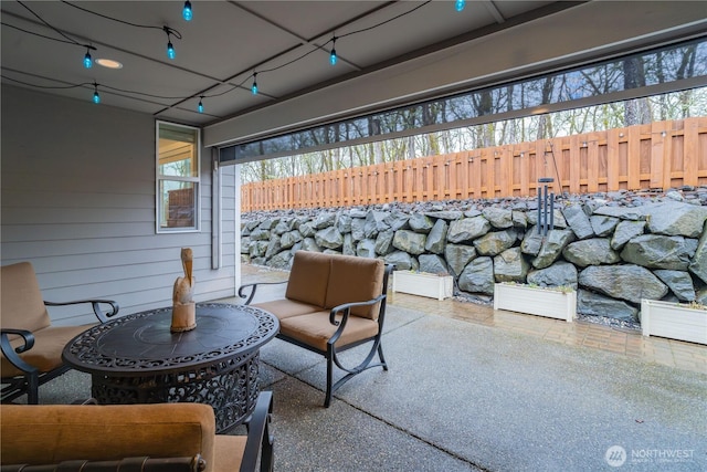 view of patio with fence