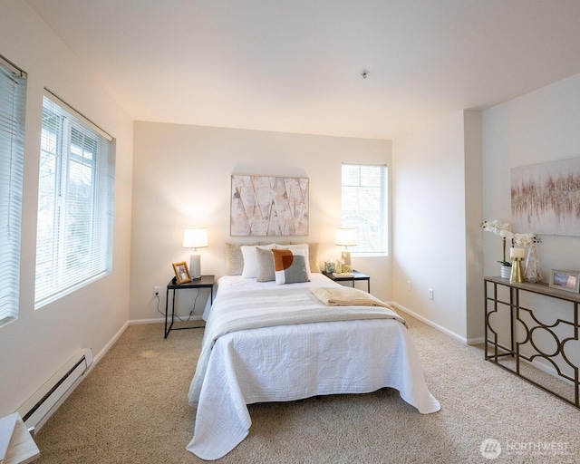 bedroom featuring a baseboard heating unit, multiple windows, light carpet, and baseboards