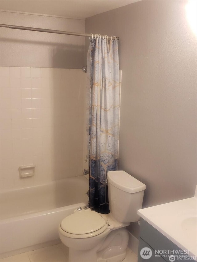 full bath featuring toilet, tile patterned floors, shower / tub combo with curtain, and vanity