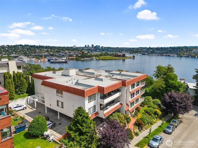 bird's eye view with a water view