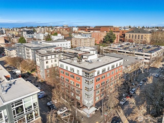 birds eye view of property featuring a city view