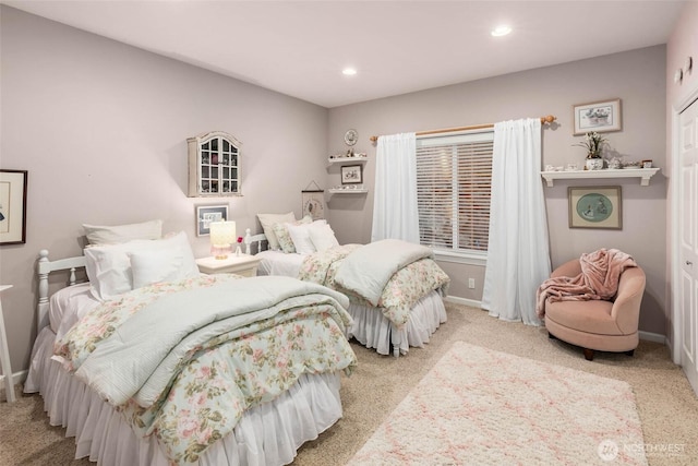 carpeted bedroom with baseboards and recessed lighting