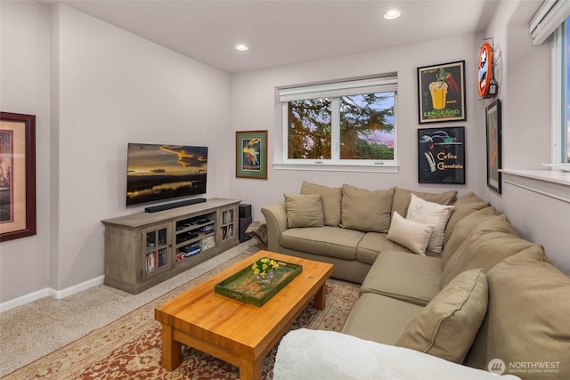 carpeted living room featuring baseboards and recessed lighting