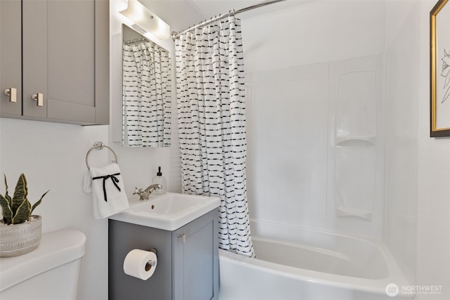 full bathroom with toilet, vanity, and shower / bathtub combination with curtain