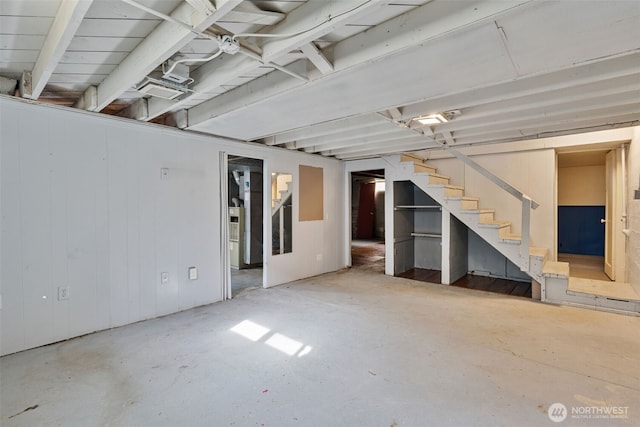 unfinished basement with stairs