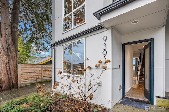 property entrance with fence