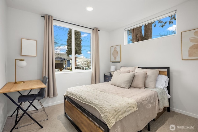 bedroom with recessed lighting, baseboards, and light colored carpet