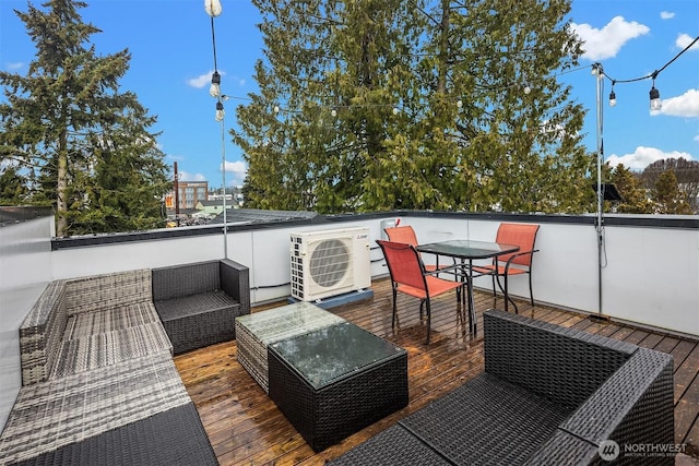 deck with ac unit, outdoor dining area, and an outdoor hangout area