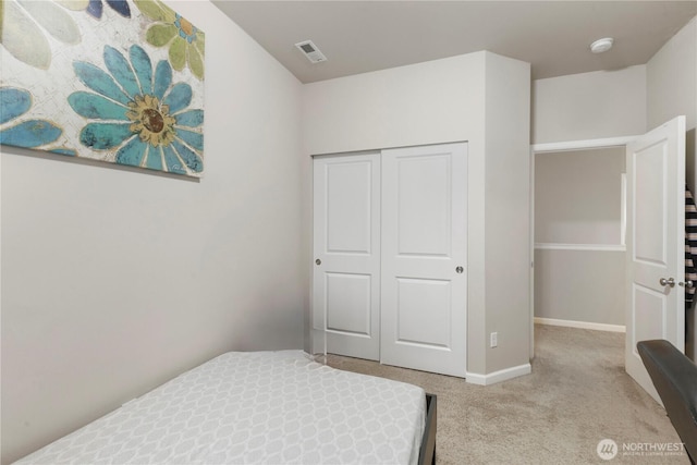 13019 SE 309th Pl, Auburn, WA 98092 - carpeted bedroom with visible vents, baseboards, and a closet