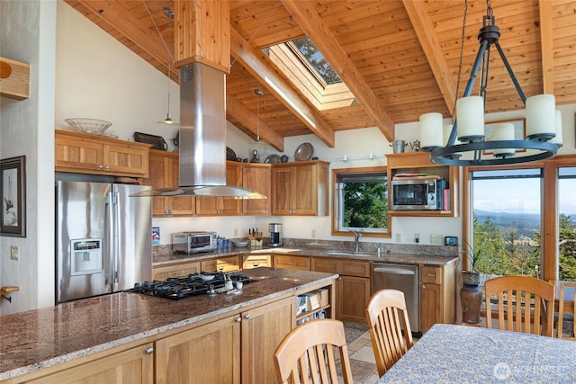 312 Stormridge Rd, Friday Harbor, WA 98250 - kitchen featuring island range hood, stainless steel appliances, a sink, a skylight, and beam ceiling