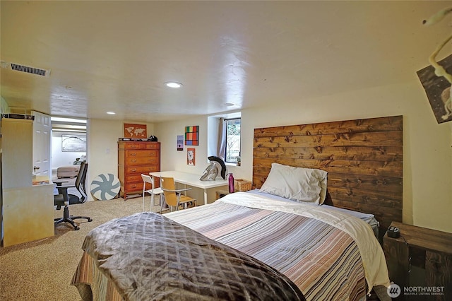 bedroom with light carpet and visible vents