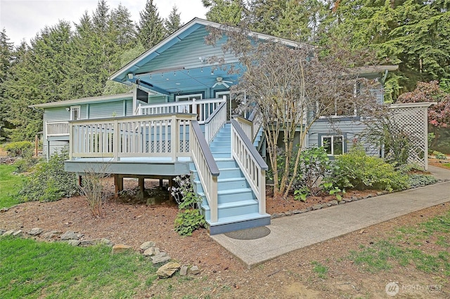 3045 Mabana Heights Rd, Camano Island, WA 98282 - rear view of house featuring stairway and a wooden deck