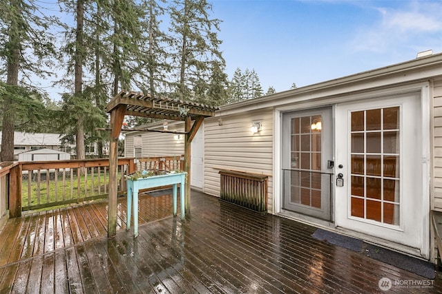 wooden deck with a pergola