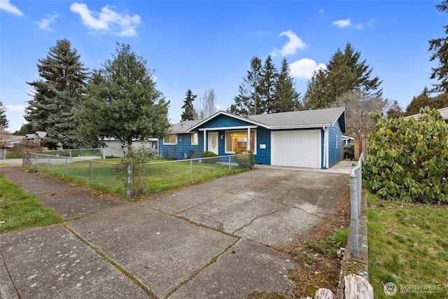 ranch-style house featuring a garage, a front yard, concrete driveway, and a fenced front yard