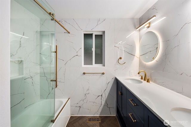 bathroom with washtub / shower combination and vanity