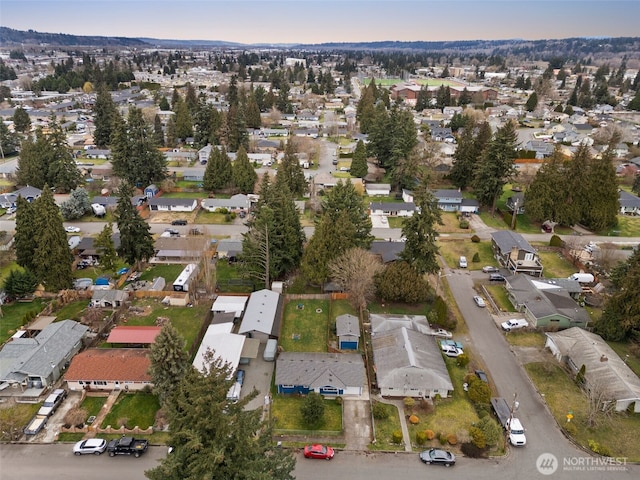 birds eye view of property with a residential view