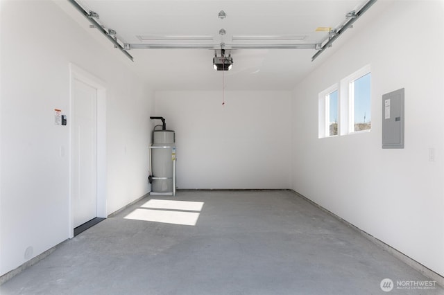 garage featuring a garage door opener and electric panel