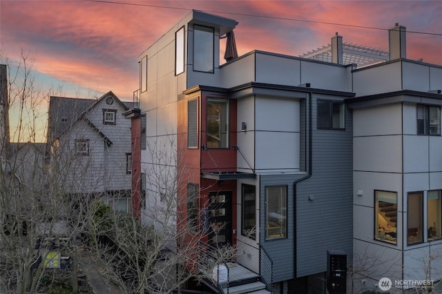 view of property at dusk