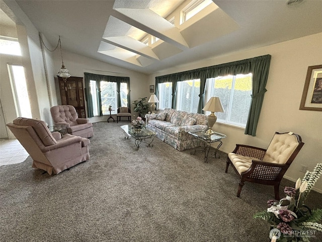 carpeted living room featuring lofted ceiling and a healthy amount of sunlight