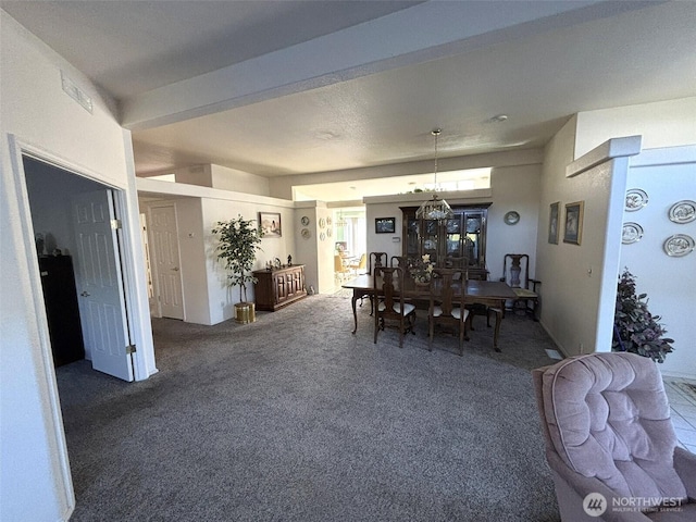 view of carpeted dining space