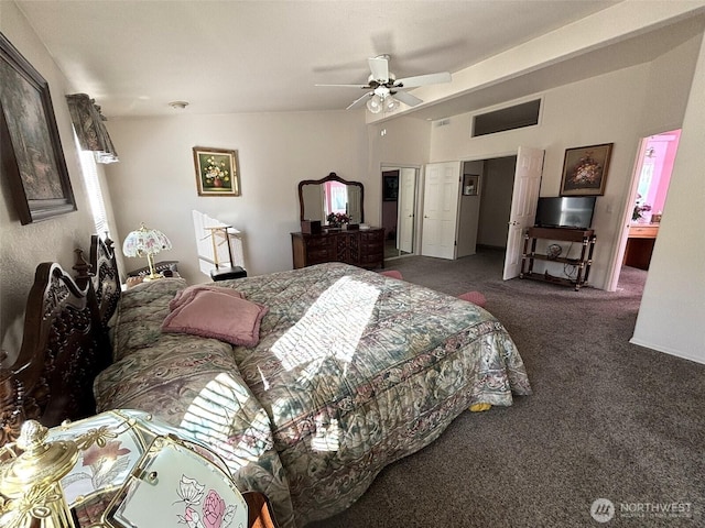 carpeted bedroom featuring visible vents and a ceiling fan