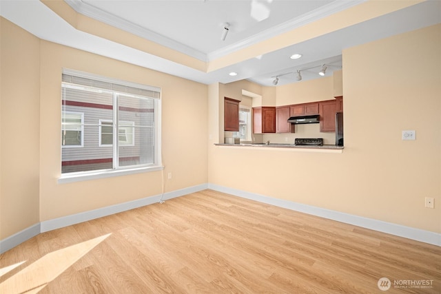 251 W Bakerview Rd Unit 306, Bellingham, WA 98226 - unfurnished living room with ornamental molding, light wood-type flooring, and healthy amount of natural light
