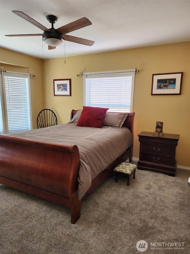 bedroom with baseboards, carpet, and ceiling fan