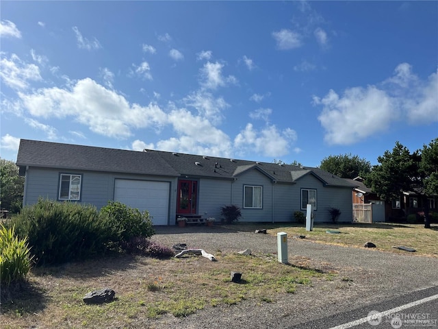 single story home with a garage