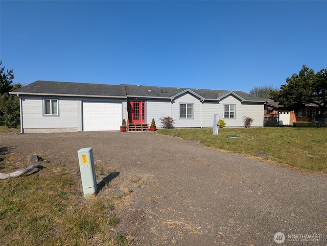 30801 I St, Ocean Park, WA 98640 - view of front of house featuring a garage, driveway, and a front yard