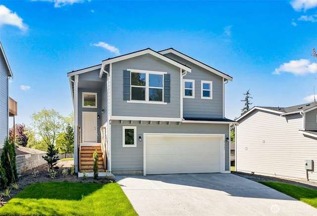 view of front of home with fence, a garage, and driveway