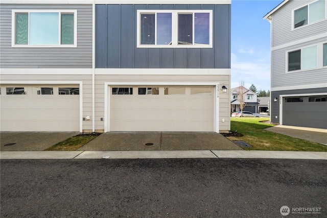 view of front of home with board and batten siding and a garage